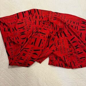 Red Vogue Print Wide Legged Pants.